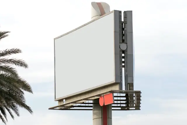 Learn billboard lighting mounting heights, fixture setback distances, extension arm requirements, billboard dimensions, uplighting vs downlighting methods, and LED billboard lighting design best practices.